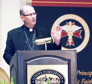Bishop James D. Conley of Lincoln, Neb., discusses the key to evangelization Sept. 27 during the Catholic Medical Association's 83rd annual educational conference in Orlando, Fla. Bishop Conley is the association's newly appointed spiritual adviser. (CNS photo/Jacque Brund) See CMA-ROUNDUP Oct. 1, 2014.
